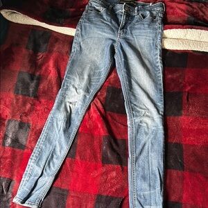 Blue Skinny Jeans with Distressed Details